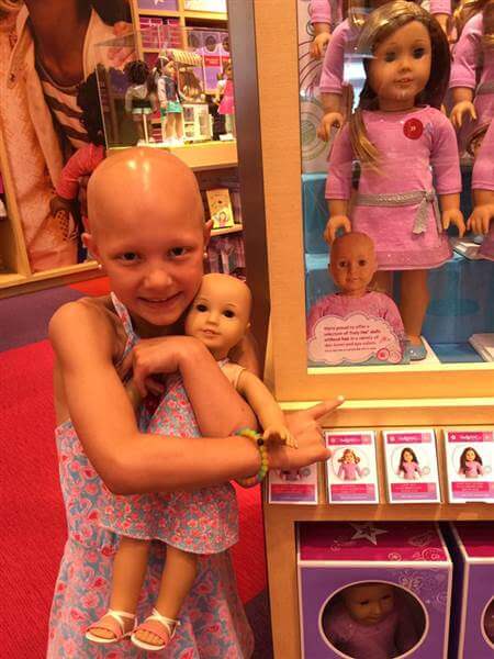 In An American Girl Store, This Bald Doll Made…