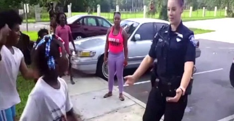 Cop Stops A Young Girl On The Sidewalk. What…