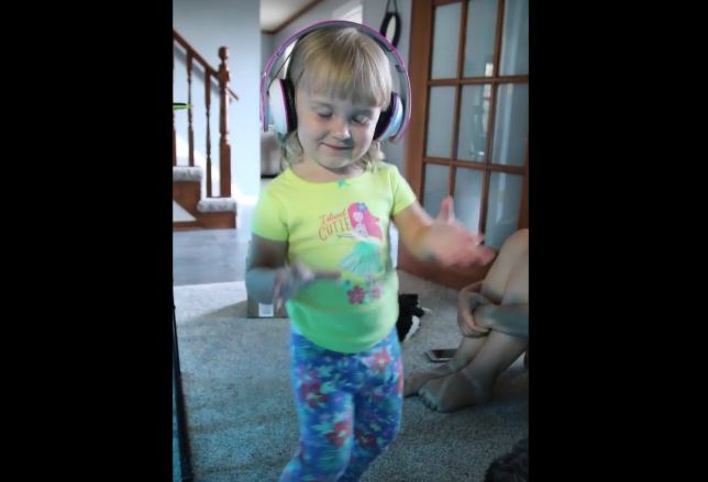 Little Girl Puts On Some Wireless Headphones. What She Does Next? So Adorably Entertaining!