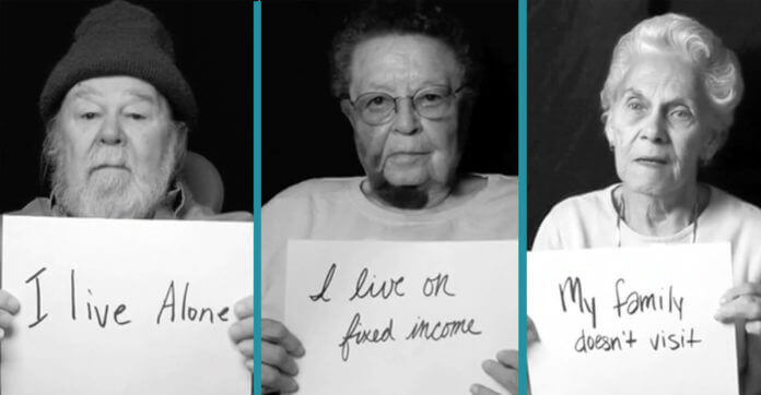 Seniors Hold Up Cards To Tell The World Not…