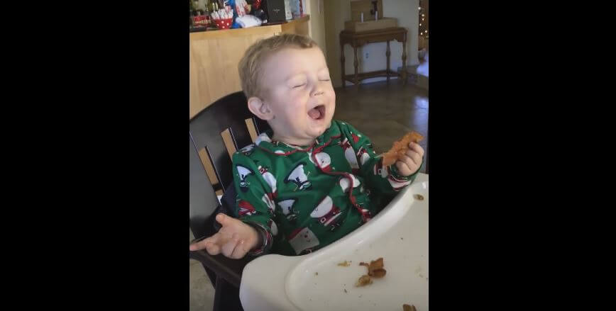 It’s This Baby’s First Time Eating A Bacon. His…