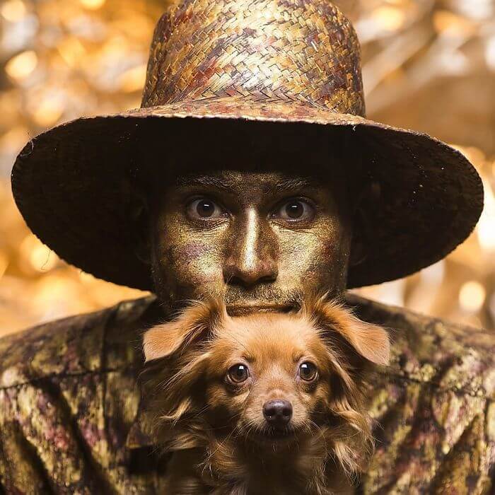 Little Dog Copies Her Bronze Owner In A Bronze Living Statue Performance